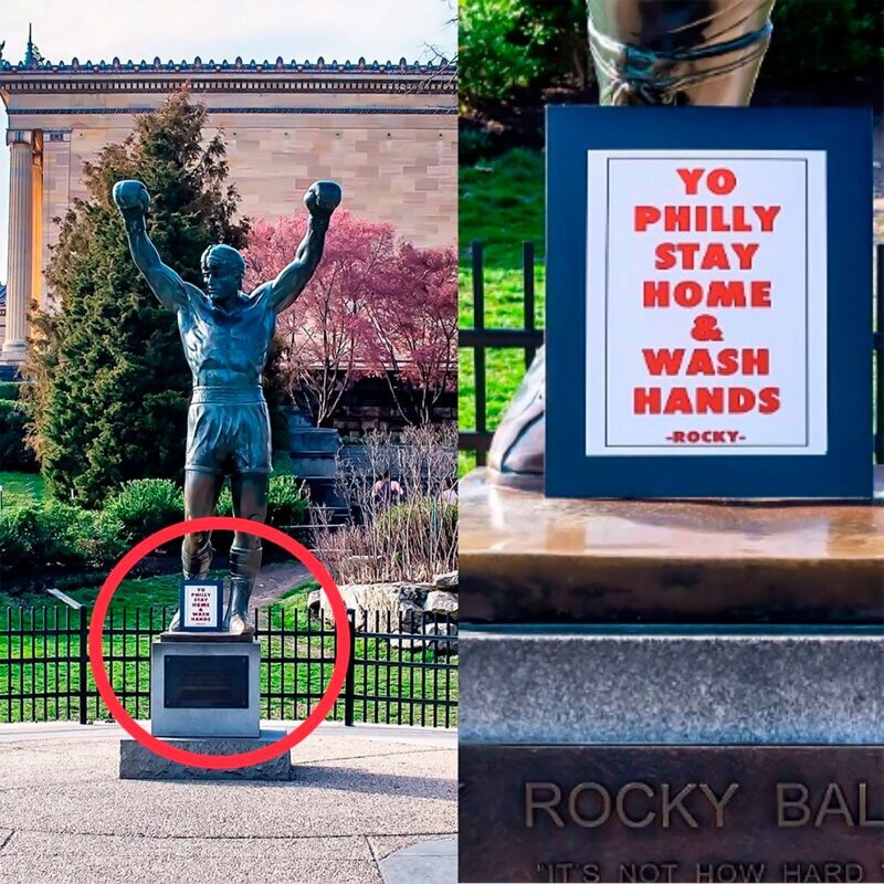A sign sitting at the base of the Rocky Balboa Sculpture outside the Philadelphia Art Museum. Coronavirus